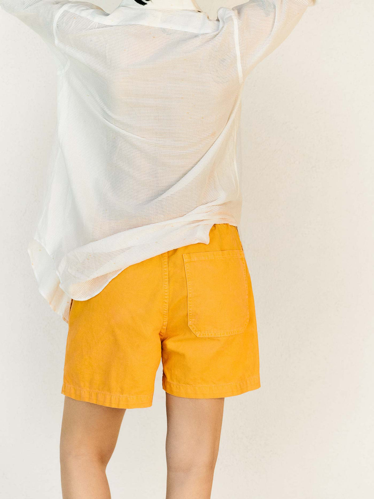 the canvas lounge short in marigold