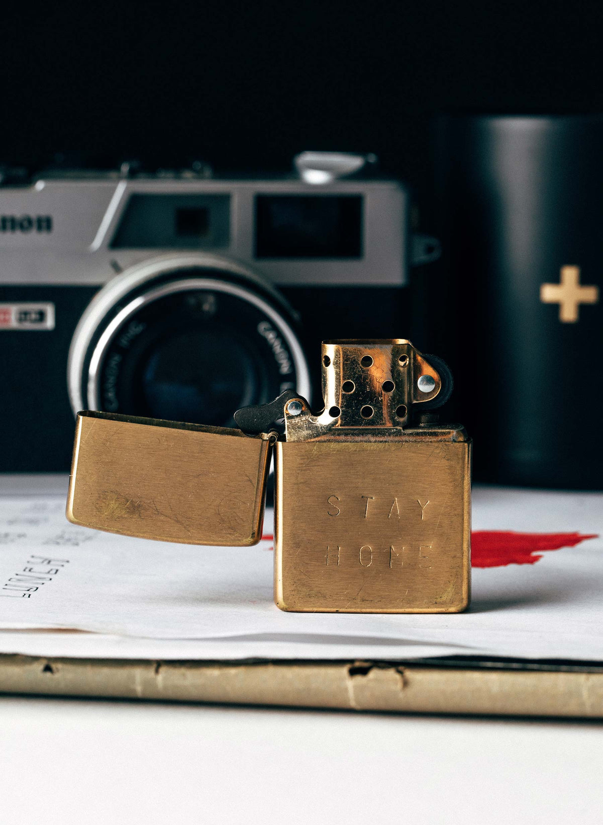 hand stamped “stay home” zippo